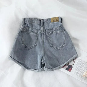 Novos shorts jeans soltos de cintura alta